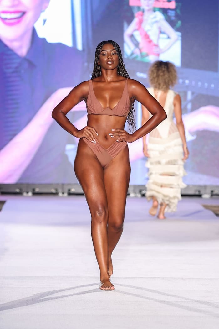 Janell Williams walks the runway for Sports Illustrated Swimsuit Runway Show During Paraiso Miami Beach on July 16, 2022 in Miami Beach, Florida.